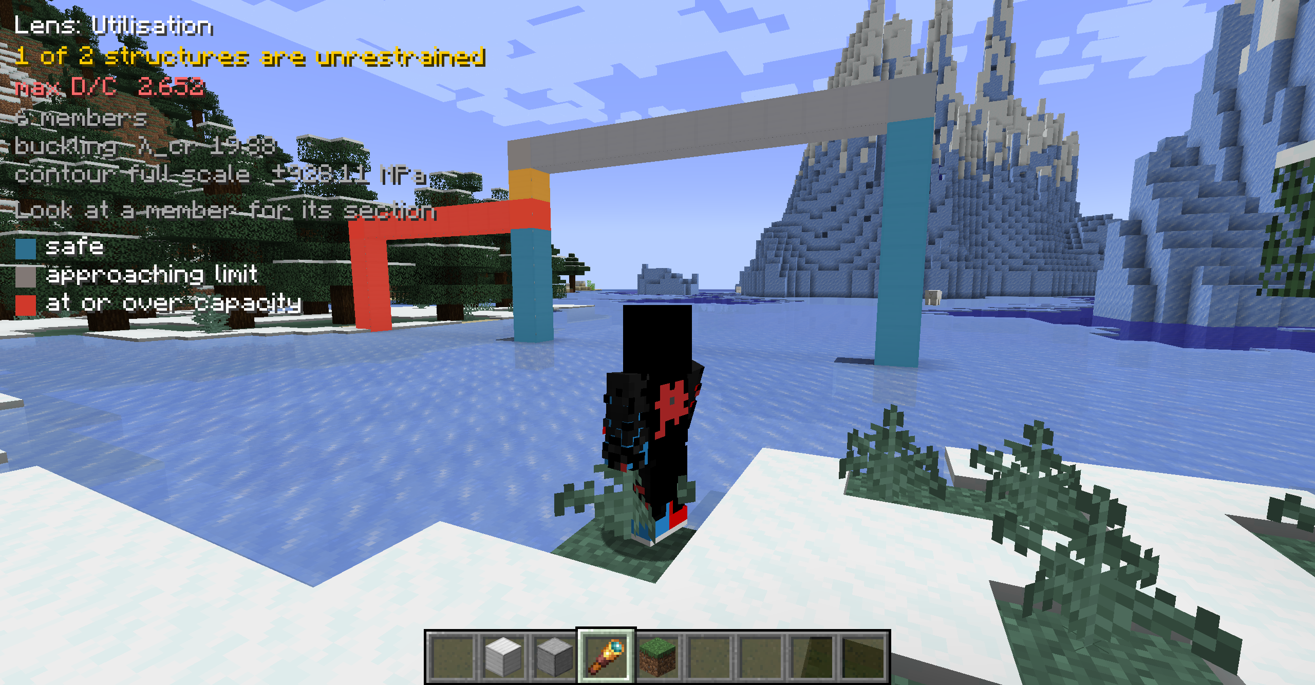 Utilisation lens across two portal frames, one coloured red at or over capacity, reporting max D/C 2.652
